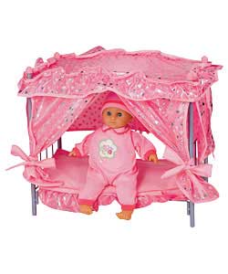 Canopy doll bed including a 38cm soft baby. Baby can speak 4 phases, press the tummy she says Mama,