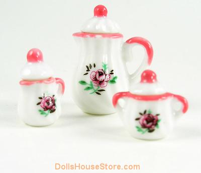 This 1:12 Scale Pretty Pink Floral Coffee Set comprises of a coffee pot, Lidded Cream Jug and