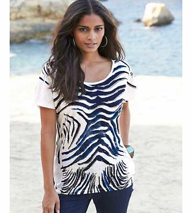 We love the eye-catching print and comfortable interlock knit. Scooped round neckline. Long sleeves.