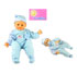 Press my tummy to make me laugh!  The doll with soother comes neatly presented in a Snuggles