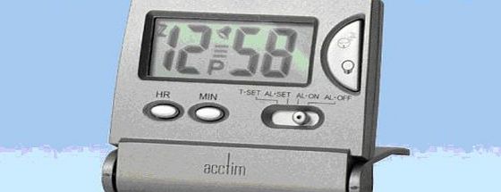 Acctim Travel Alarm Clock. Silver case, LCD display,alarm, light, Snooze button Folds flat for packing. Batteries included.