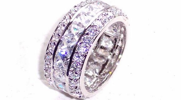 HIGH END DESIGNER ETERNITY RING WITH PRINCESS CUT 4X4MM SWAROVSKI ELEMENT CRYSTALS SURROUNDED BY BRILLIANT ROUND CRYSTALS. RHODIUM BONDED LUXURY QUALITY. BEST SELLING EYE CATCHING RING