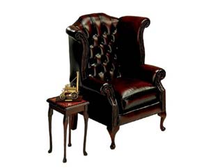 Antique replica scroll wing chair