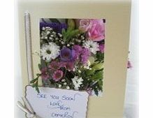 Freesia fresh flower in a card by post