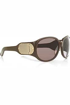 Chocolate large plastic frame sunglasses with designer embossed metal hinges on each side.