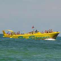 Beach with Sea Screamer Speedboat