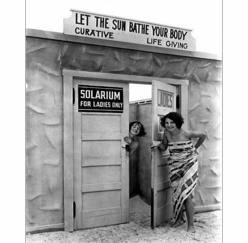 Clifton R. Adams Poster 30 x 40 cm: Bathing beauties emerge from a solarium, a tanning booth by Clifton R. Adams / National Geographic - high quality art print, new art poster