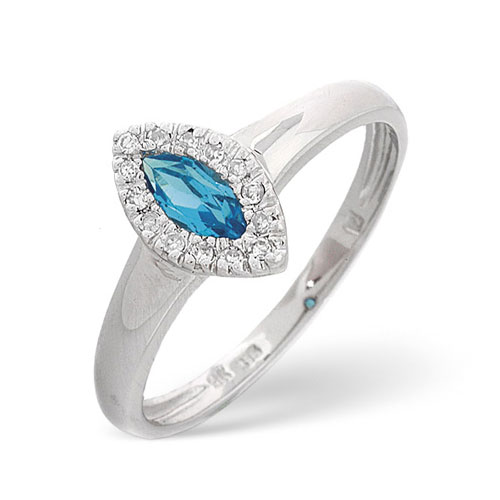 0.06 Ct Diamond and Blue Topaz Ring In 9 Carat White Gold