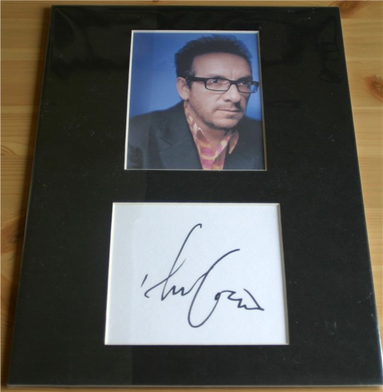 ELVIS COSTELLO SIGNATURE and PHOTO MOUNTED 12 x 9