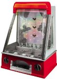 Fairground Collection Penny Pusher. Drop the penny at just the right time and get your reward.