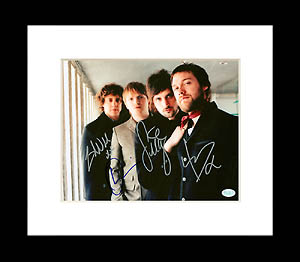 FamousRetail Kasabian multi-signed 10x8 photo