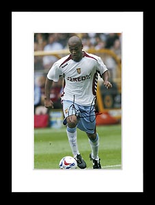 FamousRetail Luke Moore signed 8x12 photo