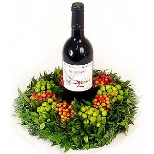Flowers Directory Berry Wreath and a bottle of Red Wine