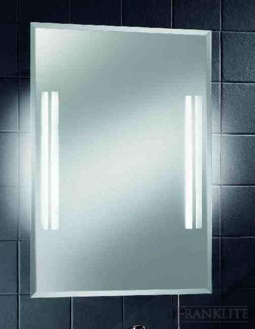 Illuminated low energy bathroom mirror with bevelled edges.