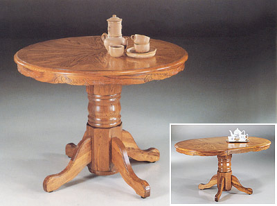   Table on Colonial Oak Round Extending Dining Table