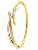 Goldsmiths 9ct yellow and white gold cubic zirconia bangle
