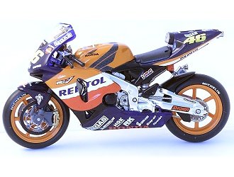 Die-cast Model Honda RC211V (V. Rossi) (1:24 scale in Orange with graphics)