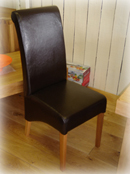 Roll Back Leather Skirted Dining Chairs