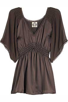 Chocolate brown V-neck blouse with smocked waist and lace trim.