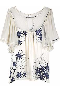 Cream silk satin top with a navy floral print and sheer chiffon sleeves.