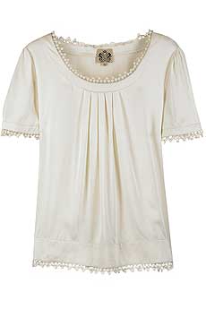 Cream silk top with crochet trim around the neckline.