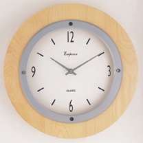 contemporary metal and birch wall clock