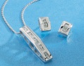 white gold and diamond pendant and earring set
