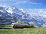 Media Storehouse Photo Jigsaw 16x12 (40x30cm) Jungfrau railway and the Jungfrau, 13642 ft by Robert Harding