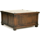 dark wood coffee table or double trunk