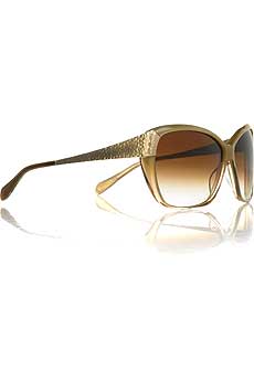 Sand framed sunglasses with amber bronze graduated lenses.
