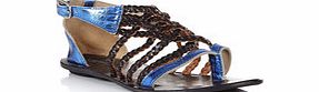 Metallic blue leather gladiator sandals