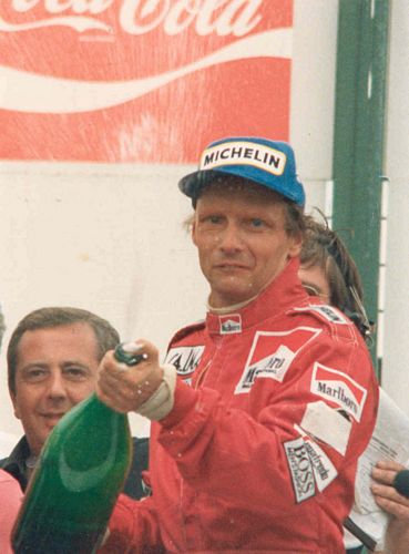 Lauda Spraying Champagne Podium Photo (17cm x 12cm)