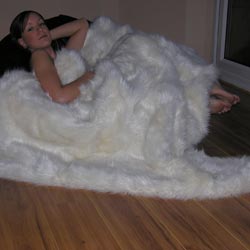 cream longhair faux fur throw