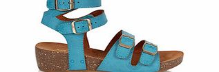 Blue gladiator-style low wedges