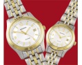 SEKONDA ladies and gents gold/silver matching watches