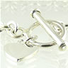 Silver bracelet with heart shaped tag and t bar closure