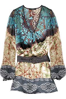 Multi-colored printed silk blouse with V-neck and a buckle fastening braided leather belt at waist.