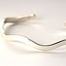 Solid silver narrow wavy bangle