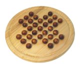 Solitaire board with wooden balls