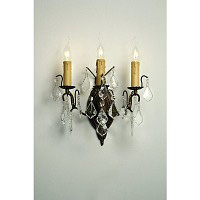 This is a stunning bronze wall light with clear crystal droplets and candle style light bulb holders