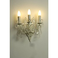 This is a stunning cream wall light with clear crystal droplets and candle style light bulb holders.