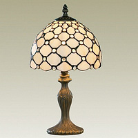 Handmade stained glass tiffany table lamp in a weathered bronze finish with clear glass droplets. He