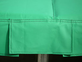 Trampoline pads with tie down tabs to protect against wind damage. 20mm thick. Green / blue colour
