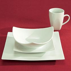 Raised square porcelain dinner set. Comprises: 4 of each dinner plates, side plates, soup plates