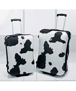 Trolley cases. Colour black and white cow print. Type of material polycarbonate. Hard. Moulded. Zip 