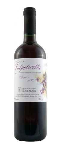 A deep purple red coloured wine, expressive aromas of violets, taste of wild woodland fruits, dry, v