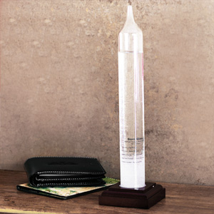 This 29cm Storm Glass Barometer with Wooden Base makes a wonderful unique unusual gift for those who love something that is not only useful but also a little quirky!This admiral Fitzroy storm glass is a barometer that come into general use in the ear
