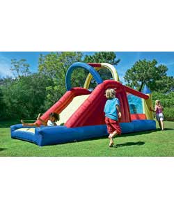 Constant air-flow system bouncy castle with climbing wall and super slide.Use under constant adult s