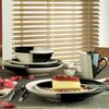 Buy this 16 piece dinner set and get another set FREE! 3 tone stripe of black, stone and cream. Set 