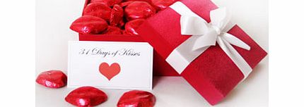Everybody loves kisses, but one is never enough, so surprise your partner with a whole box full for an unexpected romantic treat! Delivered in a red, satin-lined gift box tied with a bow, this sentimental gift includes 31 individually wrapped chocola
